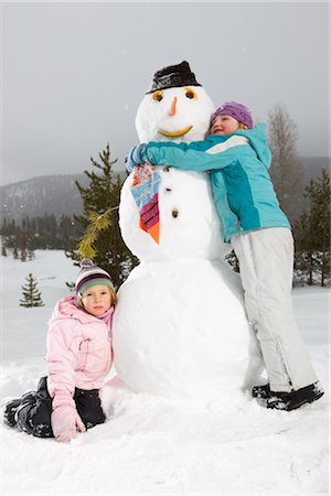 snowman with happy children